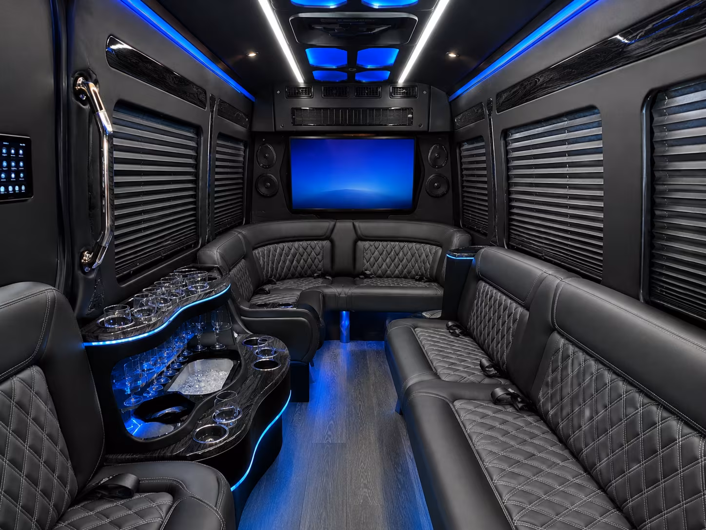 compare white black and silver prom buses in lawrence